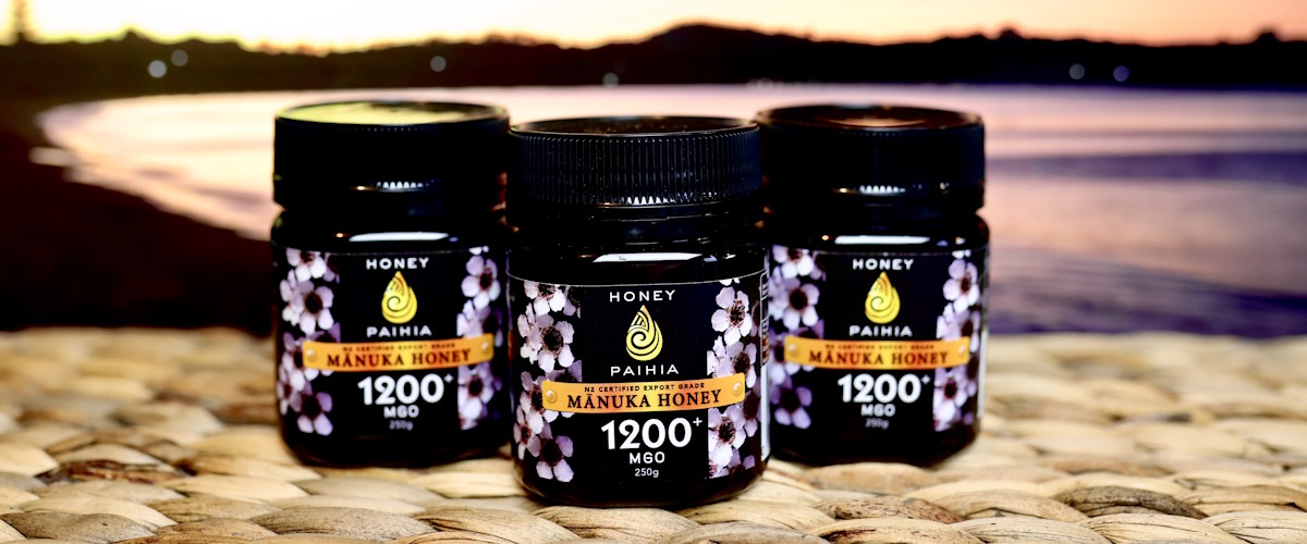 3 pots of 1200+ mgo manuka honey pictured on Te Tii beach Paihia